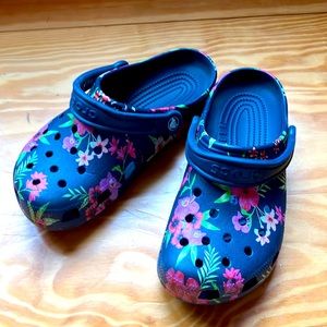 Size 8 Women’s Flowered Crocs, practically brand new